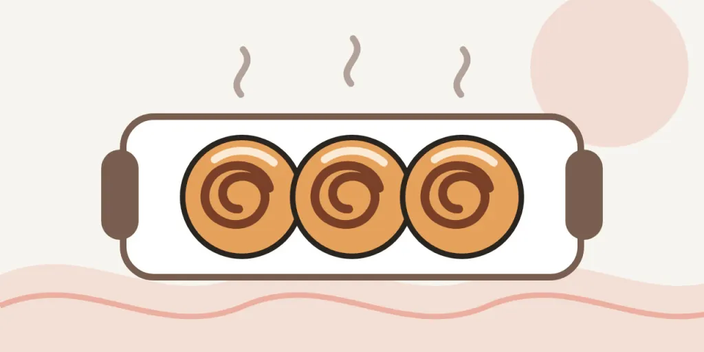 Illustration of three warm cinnamon buns on a baking tray
